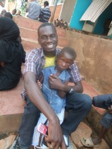 Innocent with child in Gulu, Uganda